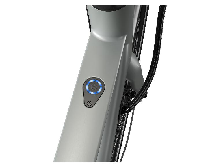 Ronde display in het frame van de Crivit e-bike met een blauwe ring voor de stand TOUR